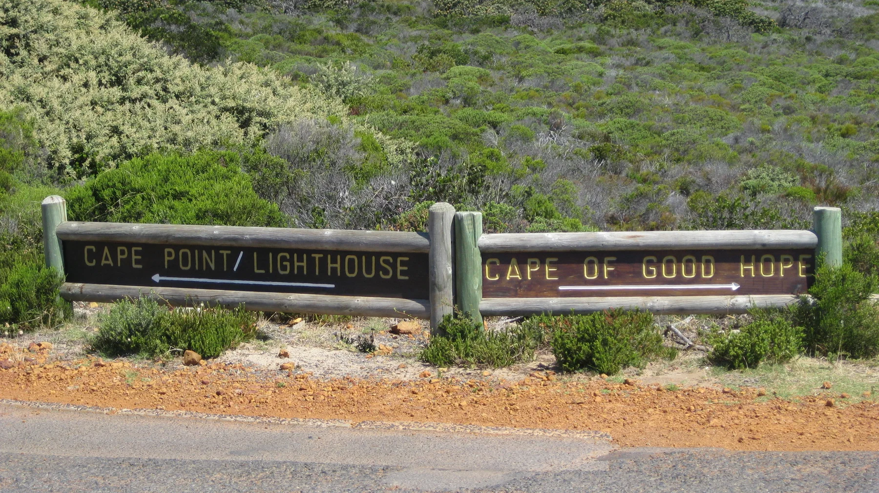 Wooden boards indicate Cape Point Lighthouse and Cape of Good Hope.